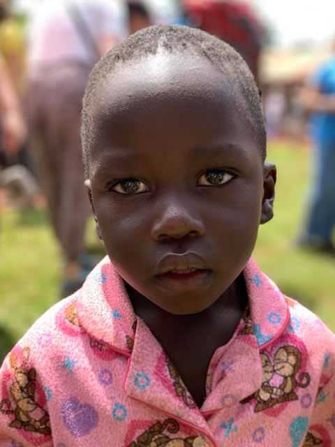 african girl with pink shirt
